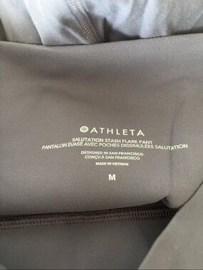 Athleta Salutation Stash Flare Pant in purple grey color
